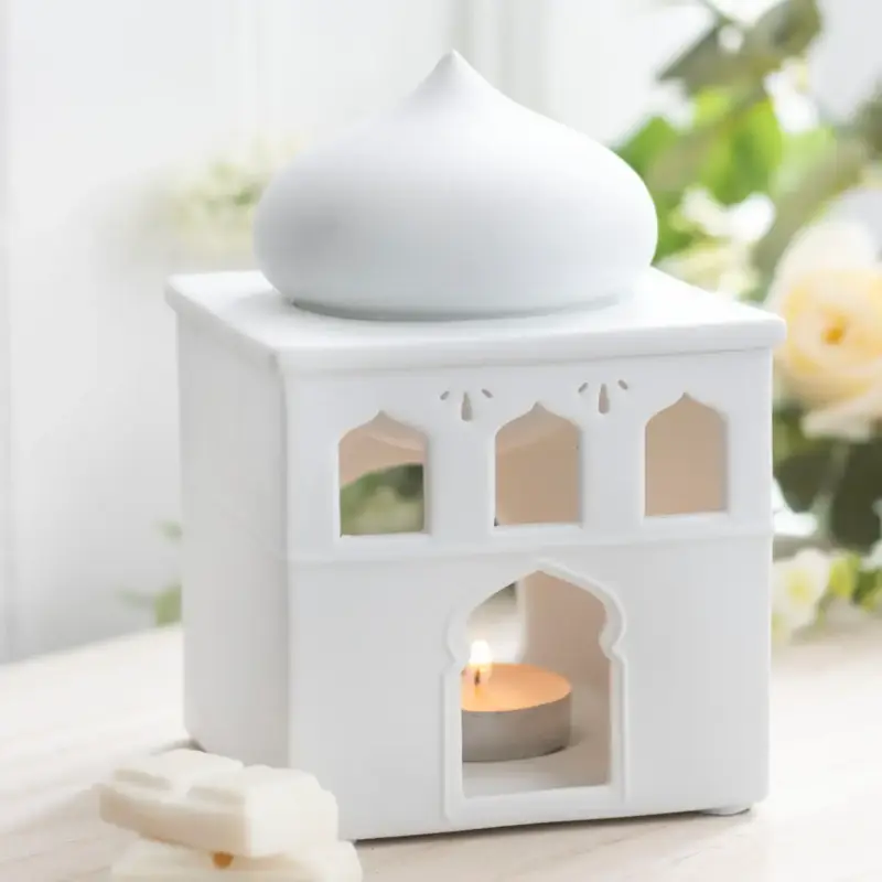 Jumah, oliebrænder og holder til fyrfadslys