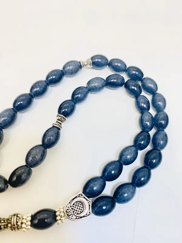Teardrop Glas Tasbih mit Silberdetails 33 Perlen