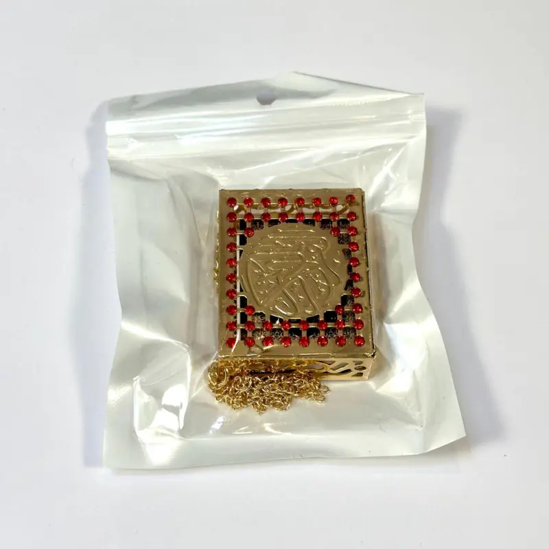 Mini koran i metalæske, guld/rød